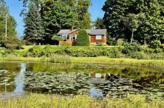 Stunning Waterfront Single Family Home with Private Beach and Large Backyard on Fish Creek – 3000 Haskins Rd.